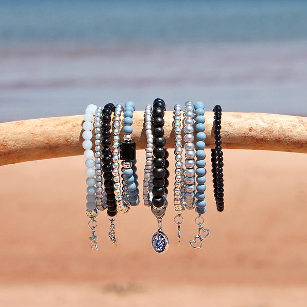 Beaded Bracelets Set of 11 Stretch Bracelets Bohemian Themed Stack in Classic Black Grey and Blues